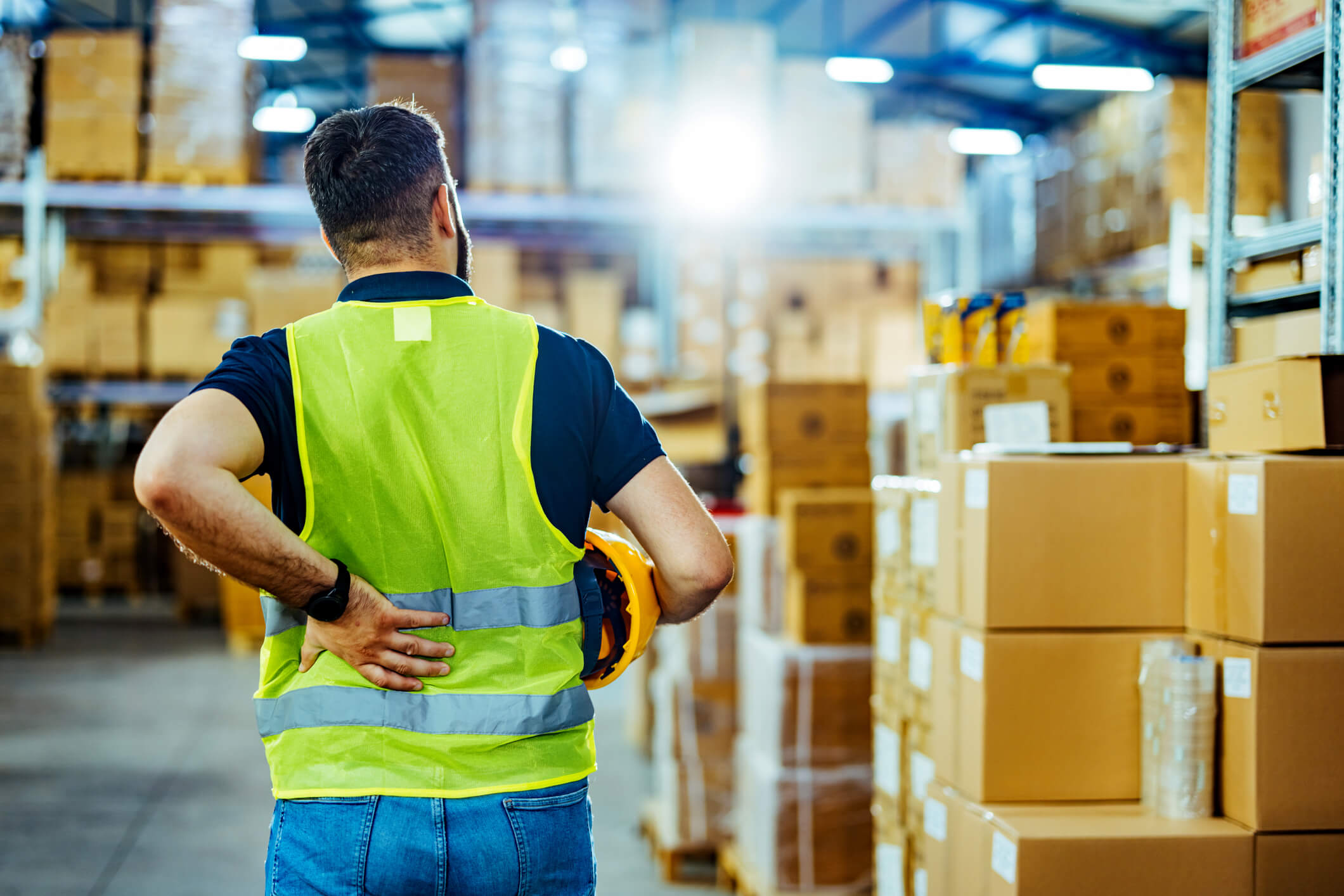 warehouse employee with lower back pain